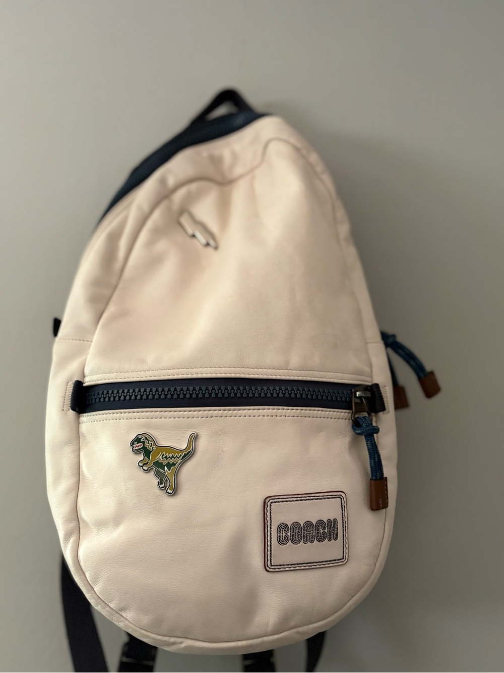 Coach Cream Sling Bag with Dinosaur Patch